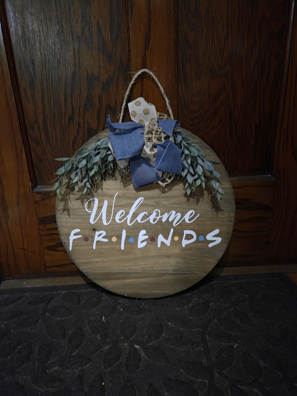 Welcome Friends Wooden Round Door Hanger with Greenery and Blue Bow